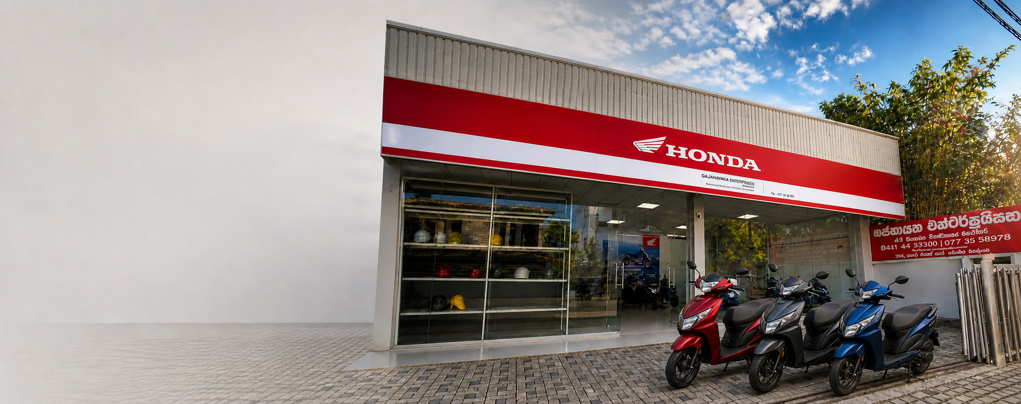 Honda Dio scooter lineup outside Gajanayaka Enterprises